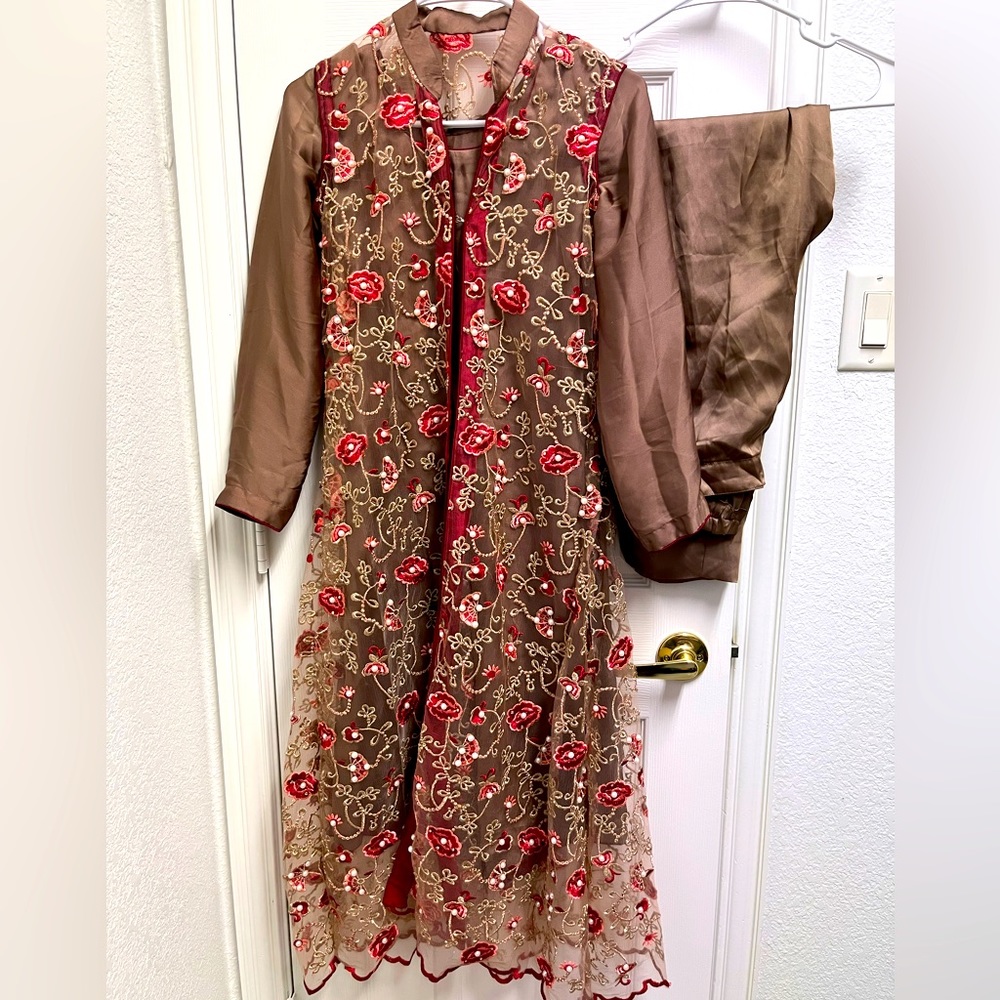 3 piece tan silk suit with net overcoat.